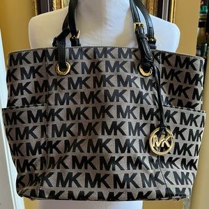 Gray and black Michael Kors Handbag